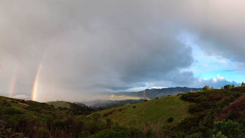 Double rainbow near Windy Hill on CA 35, looking towards the Pacific ocean, shortly after sunrise and rain